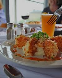 This building is one of. Enjoy Your Dining At Our Surfrider Restaurant