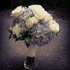Crisp and proper navy, shocking electric blue, or ethereal cloud blue. Blue Hydrangea White Roses White Gypsophila Baby S Breath Green Foliage Wedding Bouquet Bridal Bouquet Summer White Rose Bouquet Flower Bouquet Wedding