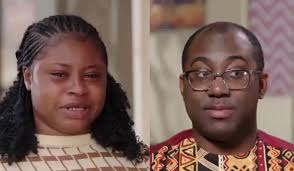 Who is the woman in the pink dress