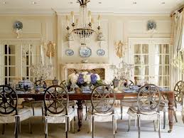 In This Dining Room Tufted Cushions And Slipcovers Dress Painted Chairs The Antique Table U Dining Room French Country Dining Rooms Country Style Living Room