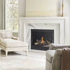 Here, the look is achieved with a. Summerford Marble Fireplace Mantel