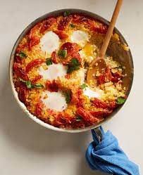 Paella With Tomatoes And Eggs Recipe Epicurious Vegetarian Comfort Food Comfort Food Vegetarian Main Dishes