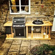 Maybe you would like to learn more about one of these? A Weber Mega Grill Combining A Weber Gas And Charcoal Bbq Into An Outdoor Kitchen Area Outdoor Grill Area Diy Outdoor Kitchen Outdoor Kitchen