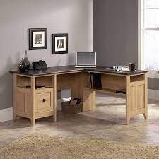 A smaller home office desk for cramped spaces. Teknik Office Oak Effect Corner Desk Furniture123