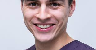 Даниэль Кум