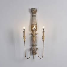 Farmhouse sconces can be great ways to add additional lighting to the walls of your home without taking up too much space. Farmhouse Rustic 3 Light Distressed Carved Wood Candle Wall Sconce Rust Metal