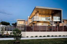 Modern flat roof house with real wood and metal siding. Modern Balcony Railing Design For House Front Novocom Top