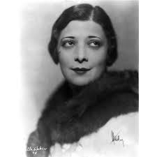 Belle Baker Close Up Portrait with Eyes Looking Up in Black Fur Boa Photo  Print