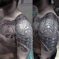 Top 93 Best Armor Tattoo Ideas 2021 Inspiration Guide Armour Tattoo Shoulder Armor Tattoo Body Armor Tattoo