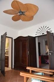 Tropical decor islander ceiling fan. Fanimation Islander Vam Ug