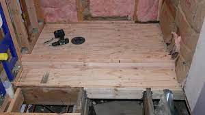 Before finish flooring is installed on top of a plywood subfloor you must waterproof the subfloor especially in a bathroom. Plywood Subflooring In Bathroom For Tile And Under Shower Building A Shower Pan Shower Remodel Diy Tile Shower