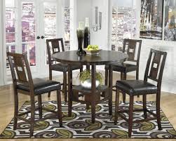 D260223 In By Ashley Furniture In Wichita Ks Table 4 Barstools Counter Table Set Counter Height Dining Room Tables Counter Height Dining Table
