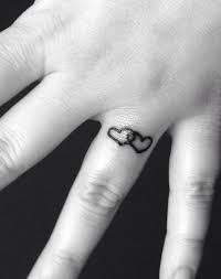 Double Hearts On Ring Finger Covered By My Wedding Ring When I Wear It Tattoo Wedding Rings Ring Tattoos Tattoos