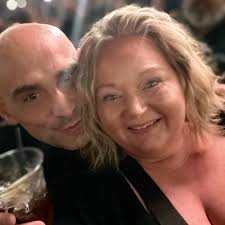 Here's a picture of my grandparents back yard( 879 East Poplar Street)  facing the Alley and this was a garage that fixed cars etc. Does anyone  remember it before it was torn