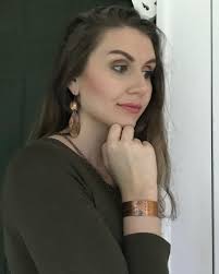 Antler Love" Is the name of the creation of these earrings. I love the  earth feel that this pair has. The deep color of the turquoise is vibrant.  Etching the design into