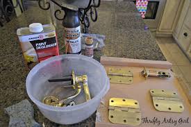 Spray paint is too thin. Thrifty Artsy Girl Diy Spray Painted Doorknobs From Cheap Brass To Expensive Oil Rubbed Bronze