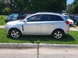 Image result for Silver Topaz 2013 Captiva