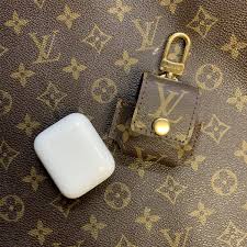 The Louis Vuitton Apple Airpods Case Custom Key Features 1 Made Using An Authentic Re Purposed Apple Accessories Phone Case Accessories Iphone Accessories