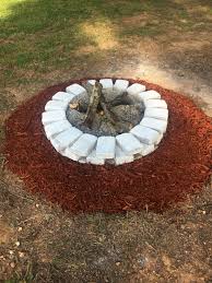 Cheap Way To Update Your Fire Pit Spray Paint The Brick And Put Red Mulch Around Backyard Landscaping Backyard Landscaping Designs Small Backyard Landscaping