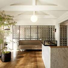 Cap a short glass block wall with a countertop, and you have yourself a bar. Glass Blocks Are Cool Again Here S Why You Should Care Architectural Digest