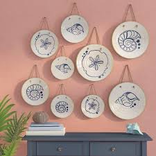 Hanging wall plates with hot glue and a safety pin will not be visible when you're standing in front of them. Decorative Plates To Hang On Wall You Ll Love In 2021 Visualhunt