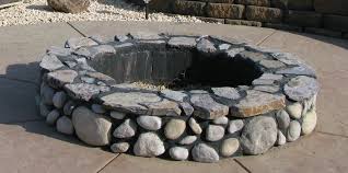 Pin By Lisa Steele On My Imaginary Dream House Fire Pit With Rocks Stone Fire Pit Outdoor Fire Pit