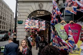 Colour item showing royal family at windsor castle + library material showing queen. Harry Meghan And Britain When Did The Fairy Tale Go Sour The New York Times
