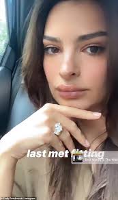 Emily ratajkowski's engagement ring photo via @emrata/instagram stories emily also appeared in alison lou's campaign for her wildly popular loucite hoop earring collection this year. Emily Ratajkowski Packs On The Pda With Sebastian Bear Mcclard In Stomach Baring Top Daily Mail Online