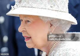 Young Esme Sutton, daughter of a staff member, plays with a balloon... News  Photo