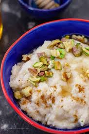 *this post first appeared on the mediterranean dish in 2018 and has been recently updated with new information and media for readers' benefit. Rice Pudding Garnished With Pistachios Pudding Recipes Middle Eastern Rice Pudding Recipe Middle Eastern Desserts