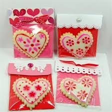 Interesting packaging with cookies wrapped inside beautiful materials is also a reason why packaging of cookies and other foods plays a very important role for its massive selling. Capadia Designs Cookie Packaging Details Valentine S Day Sugar Cookies Cookie Packaging Valentine Cookies