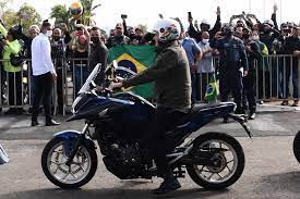Between 14,000 and 18,000 images are keyworded per day. As Covid Continues To Rage Bolsonaro Leads Motorcycle Rally Of Supporters World The Jakarta Post