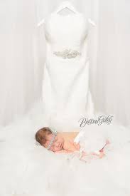 Try to keep the dress code in mind, yes, even for the little ones. Newborn Photo Ideas Introducing Emery Wedding Dress Newborn Photo