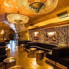 Voted the best steelers bar in new york city, hibernia is located in new york city's iconic hell's kitchen neighborhood. Secret Nyc On Instagram A Stunning Shot Of The Very Opulent Gold Bar And Their Wall Of Gold Skulls Mysecretnyc Gold Bar Nyc New York Eats Hall Decor