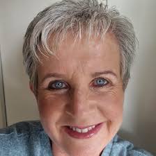 British woman author of murder mysteries with female detective?