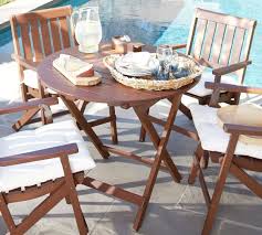 This is a portable outdoor. Chatham 36 Fsc Mahogany Folding Patio Bistro Table Honey Pottery Barn