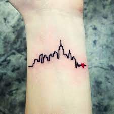 At the bottom near his wrist is love park, the septa map and the drexel. New York Skyline Tattoo Tasteful Tattoos Tiny Wrist Tattoos
