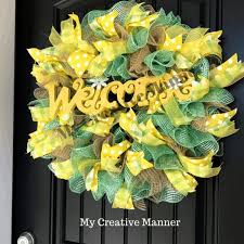 This little bear got a blue ribbon around his neck to. How To Make A Beautiful Mesh Wreath For Your Front Door