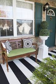 Did you like this tutorial on how to paint a cement floor? How To Paint Stripes On Your Front Porch Cuckoo4design