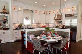 Wallpaper by hines & company, and herringbone flooring complete the look. 10 Kitchen Islands That Feature Banquette Seating