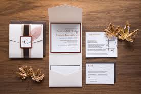 Invitations are styled in a rustic oak tree bark background with a carved heart where the wedding information is fitted inside the template. Sarah Matthew S Rustic Letterpress Wedding Invitations