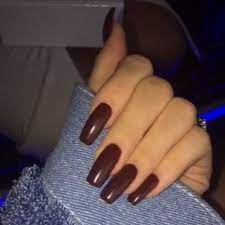 Each of kylie's nails are painted a slightly different shade of brown, ranging from a sandy hue to a warm chocolate, and they're all adorned with various white paisley patterns, outlined with a. Kylie Jenner S Nail Polish Nail Art Steal Her Style Kylie Jenner Nails Nails Christmas Nails