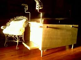 An Old Metal Chair And A Gynecologist Exam Table Caught In Late Afternoon Natural Sunlight Entry Doors With Glass Double Glass Entry Doors Old Metal Chairs