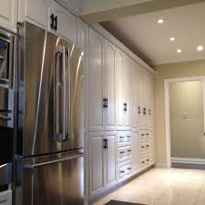 The kitchen cabinets on which catalyzed varnishes are applied retain the sheen and original paint color. Cabinet Refinishing Job In Burlington Professional Kitchen Cabinet Painting And Refinishing Services In Oakville Burlington Mississauga Milton
