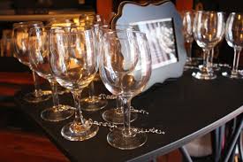 Check out this list of 75 baby shower favors,. Personalized Wine Charms Twisted Hangers