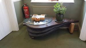 Inspired by kitchen islands that feature varied heights, the two parts are contrasted with being olive ash and the other quarter sawn white oak. Unusual Coffee Table Outside The Gents Toilet Picture Of The Tally Ho Eversley Tripadvisor