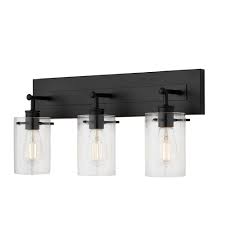 For even more vintage charm, use a compatible edison bulb to take advantage of the exposed bulb profile of these farmhouse shades. Hampton Bay Regan 3 Light Matte Black Vanity Fixture With Clear Cylinder Glass Shades The Home Depot Canada