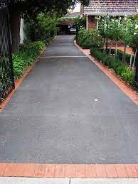 Decorative edging on asphalt driveways serves important purpose. Driveway Driveway Landscaping Asphalt Driveway Driveway Border