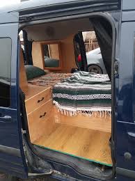 This would free up the rest of the vehicle for living space. 2015 Ford Transit Connect Affordable Camper Van Conversion Ford Transit Ford Transit Connect Camper Ford Transit Camper Conversion