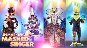 The flamingo wears a sparkly, pink pantsuit with pink feathers around the legs and arms, and pink feathers sticking out the back of her outfit. The Masked Singer Season 2 Clues Spoilers Our Best Guesses Entertainment Tonight